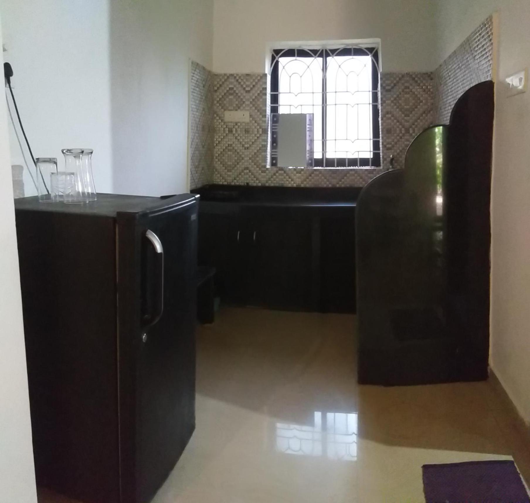 God'S Gift Morjim Hotel Room photo